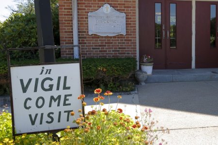 A sign marks the vigil at St. Frances Xavier Cabrini Roman Catholic church in Scituate Massachusetts