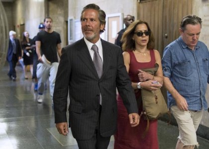 Stephen Di Carmine, former executive director for law firm Dewey and Leboeuf exits the courtroom at Manhattan Criminal Court in New York