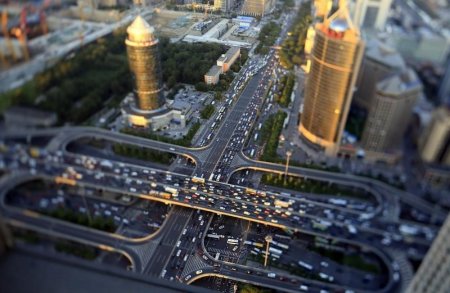 Vehicles drive on the Guomao Bridge during the evening rush hour in Beijing