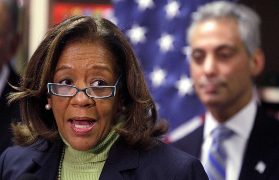 Chicago Public Schools CEO Barbara Byrd Bennett speaks at a news conference as Mayor Rahm Emanuel background listens in Chicago. The former CEO has been indicted on corruption charges following a federal investi