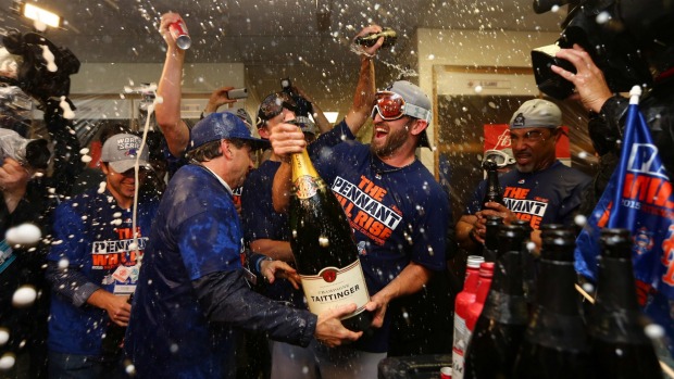 Time to celebrate New York Mets players after beating Chicago to advance to the World Series