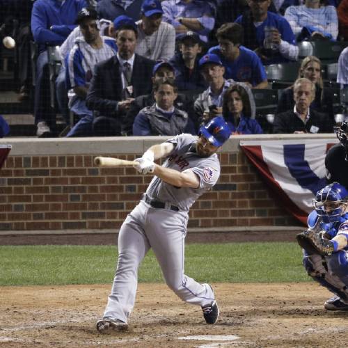 Mets&#039 Daniel Murphy hits a two-run home run during the eighth inning of Game 4 of the National League baseball championship series against the Chicago Cubs Wednesday Oct. 21 2015 in Chicago