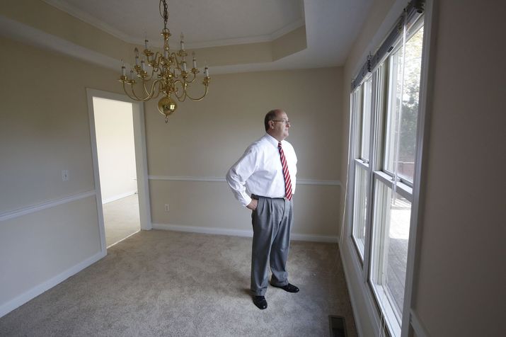 Ty Greenlees Realtor Jeff Spring stands inside a 17,000-square foot home in Washington Twp. that is for sale.. TY GREENLEES  STAFF