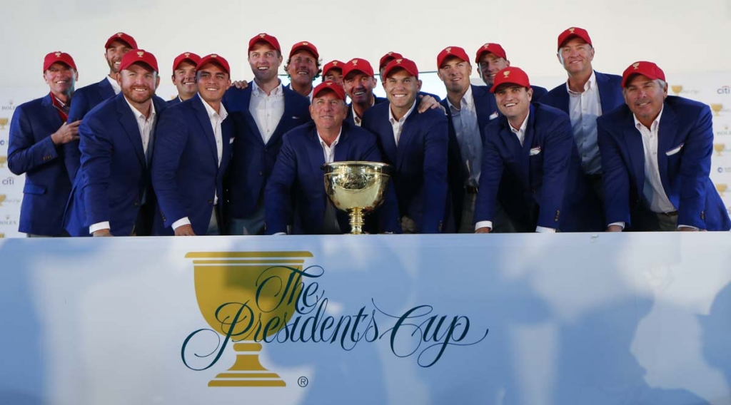 US team captain Jay Haas front centre poses with his team after they defeated the International team 15 1/2 to 14 1/2 to retain the Presidents Cup at the Jack Nicklaus Golf Club Korea in Incheon South Korea