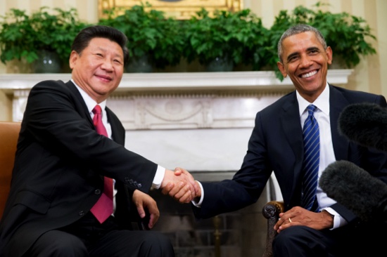 U.S. President Barack Obama poses with Chinese President Xi Jinping for