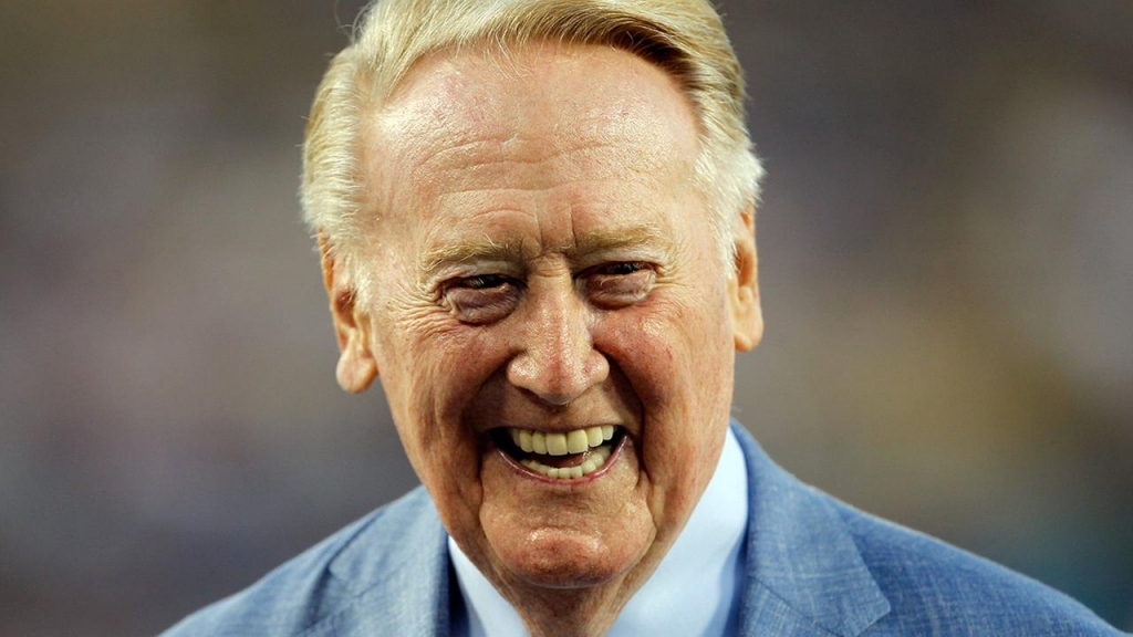 Los Angeles Dodgers broadcaster Vin Scully is honored before a baseball game against the Arizona Diamondbacks in Los Angeles Wednesday Sept. 23 2015