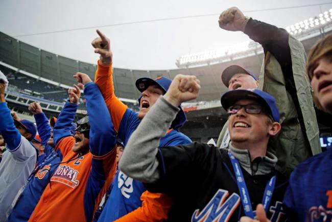 New York Mets fans cheer before Game 1 of the Major League Baseball World Series against the Kansas City Royals Tuesday Oct. 27 2015 in Kansas City Mo