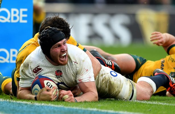 Ben Morgan of England crashes over to score the opening try