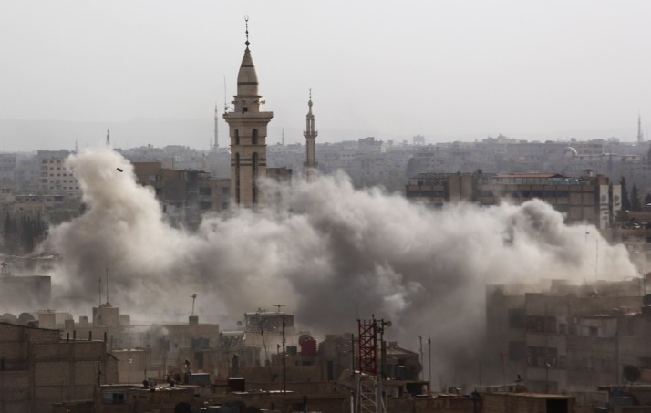 Smoke billows from the Syrian rebel-held area of Douma