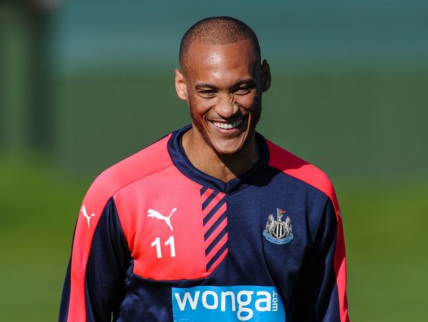 Yoan Gouffran smiles during the Newcastle United training session