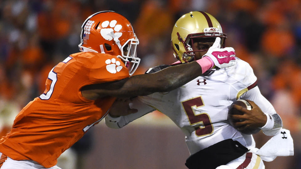 Clemson safety T.J. Green looks to get a handle on BC quarterback Jeff Smith. 1