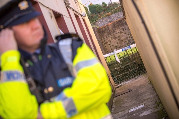 Garda outside the house in Sligo where the woman was found yesterday