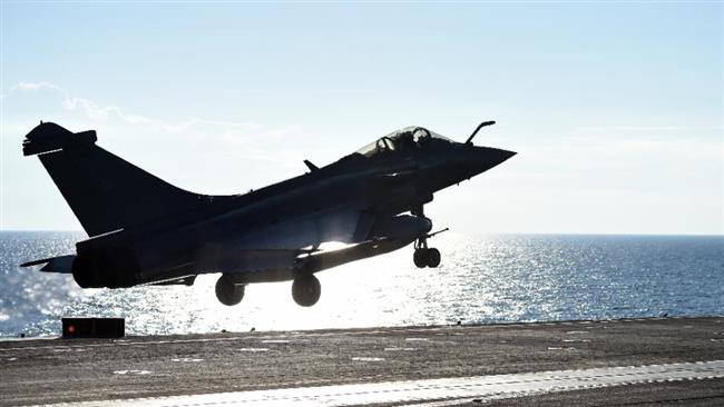 A French Rafale jet fighter takes off from Charles de Gaulle aircraft in the eastern Mediterranean Sea