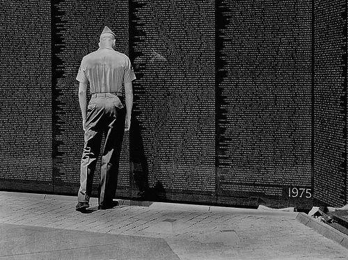 A Marine at Vietnam Memorial on 4th July 2002