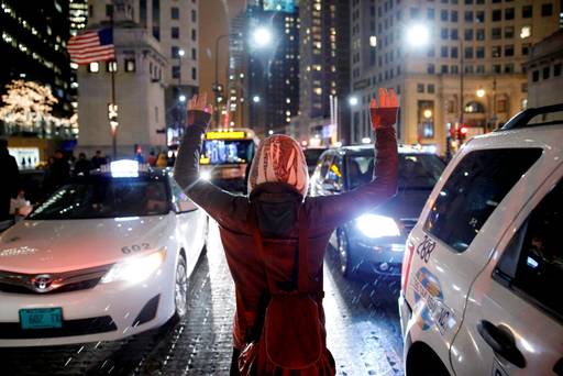 A protester demonstrates in response to the fatal shooting of Laquan Mc Donald in Chicago Illinois