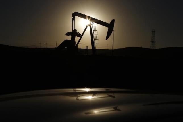 A pump jack is seen at sunrise near Bakersfield California