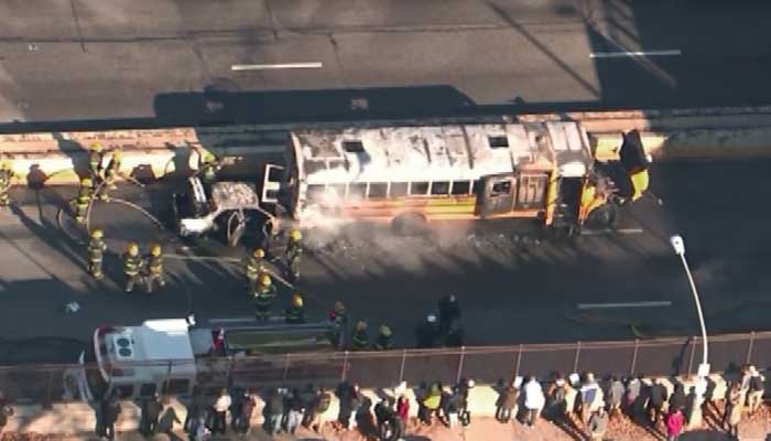 A state trooper was shot and school bus caught on fire on Vine Street Expressway in Philadelphia