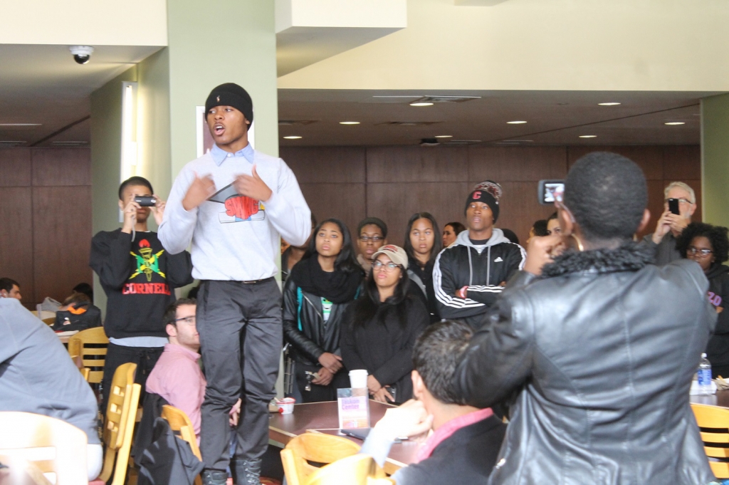 A student speaks in Trillium food court during a Black Students United action Tuesday