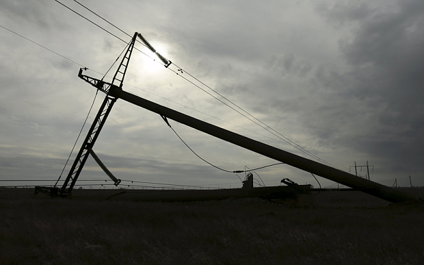 A view shows a damaged electrical pylon near the village of Chonhar in Kherson region Ukraine