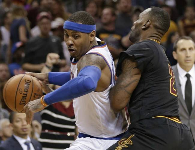 Knicks&#39 Carmelo Anthony left drives against Cleveland Cavaliers&#39 Le Bron James during the second half