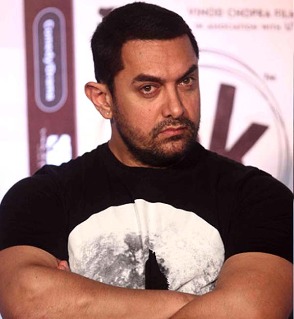 Just in: Aamir Khan's car rams into a two-wheeler!