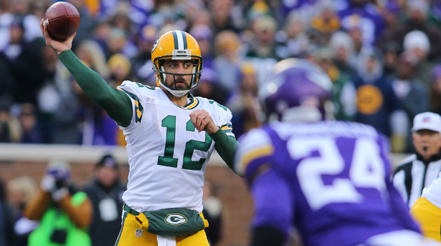 Aaron Rodgers #12 of the Green Bay Packers throws the ball against the Minnesota Vikings