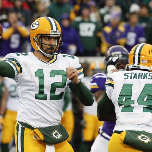 Green Bay Packers quarterback Aaron Rodgers throws against the Minnesota Vikings during the first half of an NFL football game in Minneapolis. Packers quarterback Aaron Rodgers is looking forw