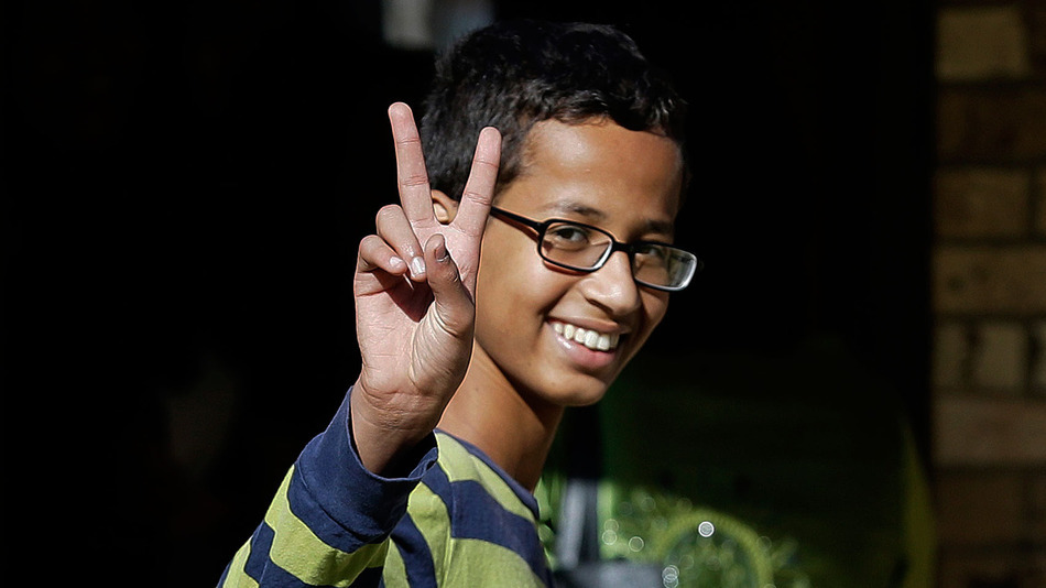 Ahmed Mohamed gestures as he arrives to his family's home in Irving Texas in September