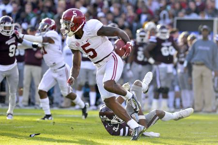 Alabama's Cyrus Jones returns a punt for a TD against Mississippi State