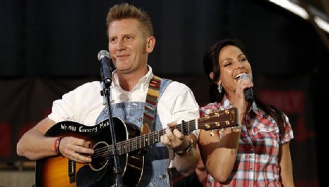 Joey Martin Feek right and Rory Lee Feek of the country music duo Joey & Rory perform at the Fremont Street Experience during the Academy of Country Music Weekend in Las Vegas on Saturday