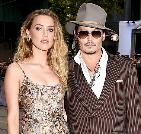 Amber Heard and Johnny Depp attend'The Danish Girl premiere during the 2015 Toronto International Film Festival