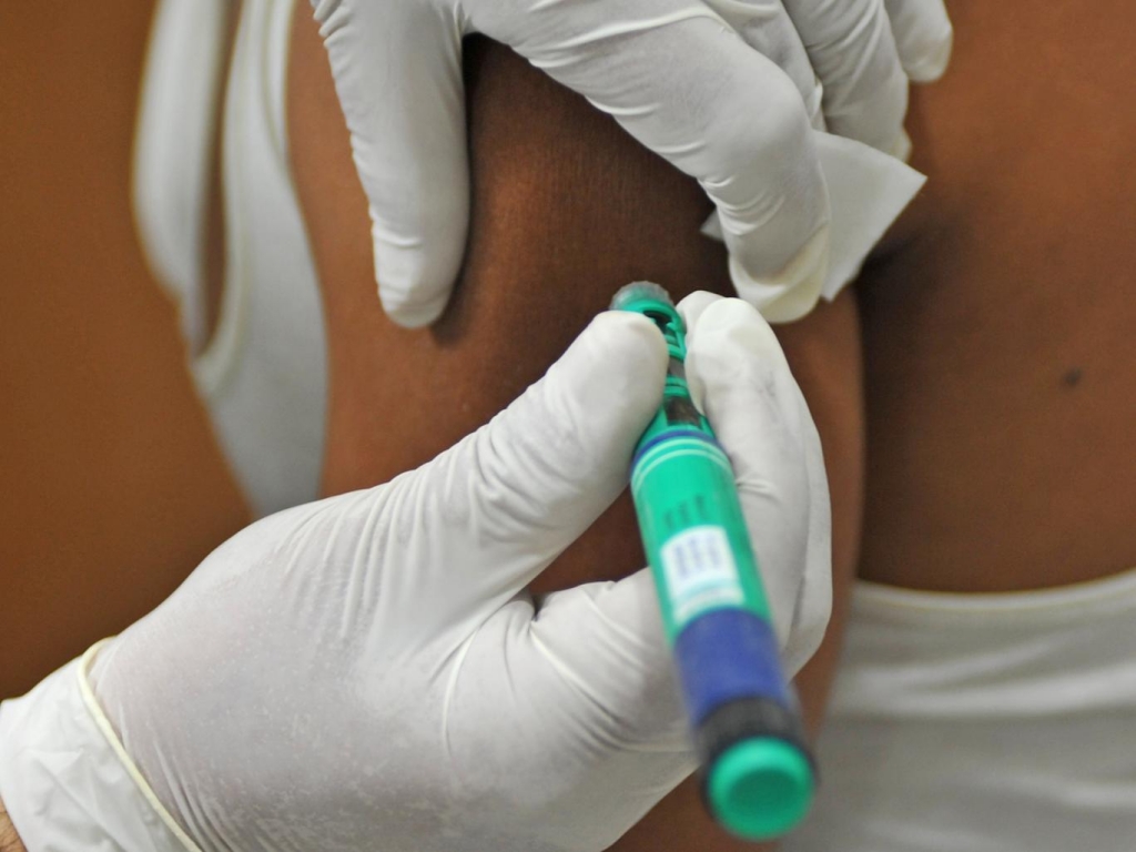 An injection of insulin is administered. File