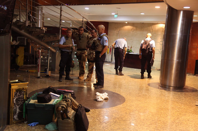 French troops rear inside the Radisson Blu hotel after an attack by gunmen on the hotel in Bamako Mali Friday Nov. 20 2015. Islamic extremists armed with guns and grenades stormed the luxury Radisson Blu hotel in Mali's capital Friday morning and