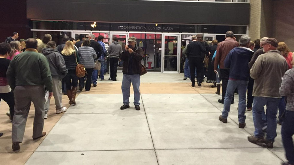 Audience members file into a Springfield Illinois venue for a Donald Trump political rally