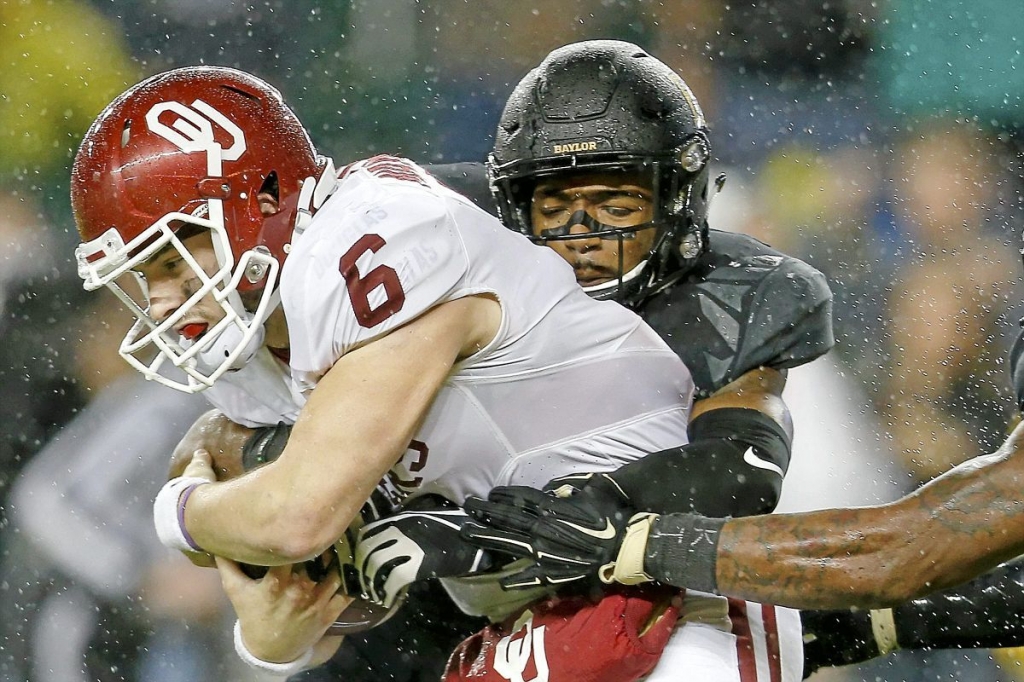 BUY THIS IMAGEOU’s Baker Mayfield is sacked by Baylor’s Travon Blanchard last week. IAN MAULE  Tulsa World