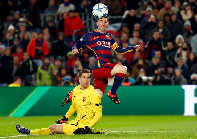 Barcelona's Lionel Messi scores his side's second goal past Roma goalkeeper Wojciech Szczesny during their Group E Champions League soccer match at the Camp Nou stadium in Barcelona Spain Tuesday Nov. 24 2015. Nampa-AP