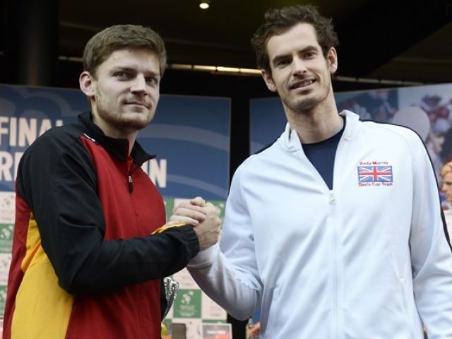 Belgian David Goffin and Britain's Andy Murray shake hands while posing