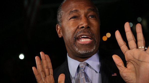 ALEXANDRIA UNITED STATES- OCTOBER 16 Republican presidential candidate Dr. Ben Carson answers questions from members of the press after delivering brief remarks to supporters at the King Street Retail Walk