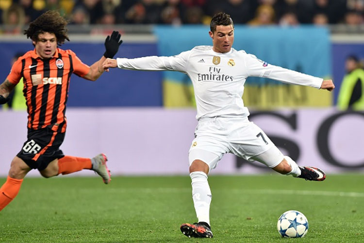 Cristiano Ronaldo sparkled as Real Madrid who had already sealed a place in the last 16 of the Champions League clinched top spot in Group A with a remarkable 4-3 win over Shakhtar Donetsk on Wednesday