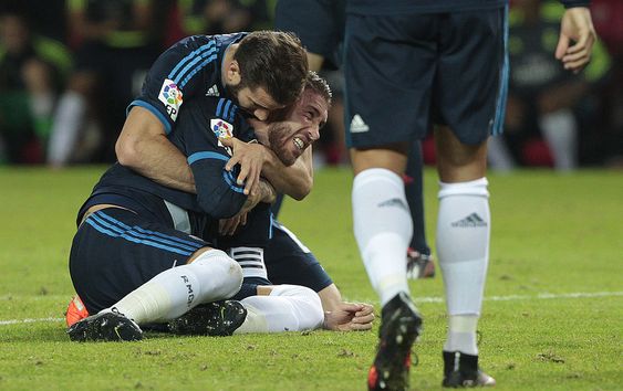 Ramos right celebrates with teammate Nacho Fernandez after scoring against Sevilla during their La Liga soccer match at the Ramon Sanchez Pizjuan stadium in Seville Spain on Sunday Nov. 8 2015