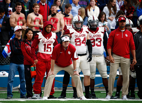 LAWRENCE KS- OCTOBER 31 Head coach Bob Stoops of the Oklahoma Sooners watches from the sidelines during the game against the Kansas Jayhawks at Memorial Stadium