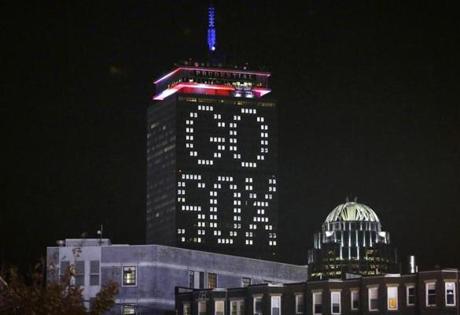 The words'Go Sox are illuminated on the side of the Prudential Tower before Game 6 of baseball's World Series between the Boston Red Sox and St. Louis Cardinals Wednesday Oct. 30 2013 in Boston.  SOX1099IMAGES