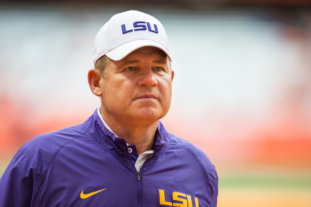 Les Miles looks on during warm ups