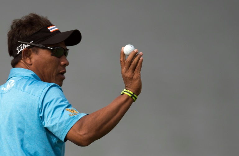 AFP  File  Johannes Eisele Thongchai Jaidee of Thailand gestures with the ball after a birdie during the BMW Shanghai Masters golf tournament at the Lake Malaren Golf Club in Shanghai