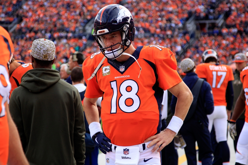 Broncos quarterback Peyton Manning prepares to take the field against the Kansas City Chiefs at Sports Authority Field at Mile High on Nov. 15 2015 in Denver Colorado