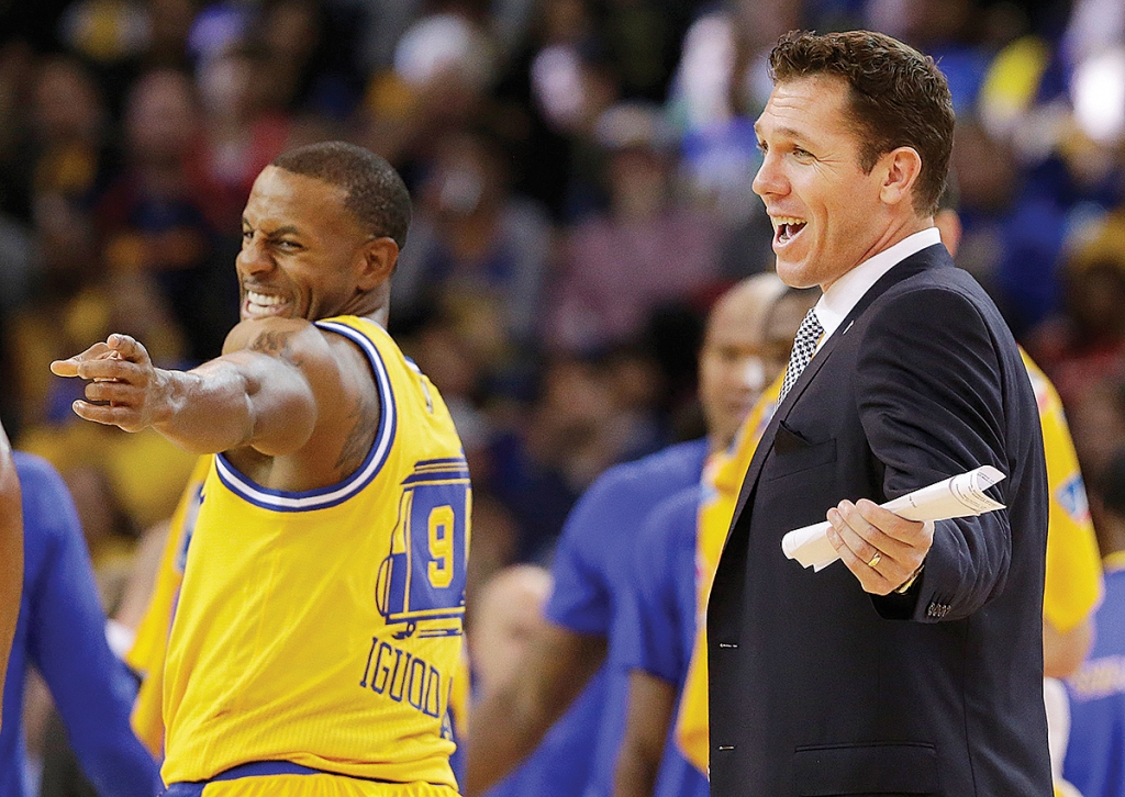 Andre Iguodala left and interim head coach Luke Walton were all smiles during the Warriors’ 111-77 win over the Lakers on Tuesday night becoming the first team in NBA history to start a season with 16 consecutive wins