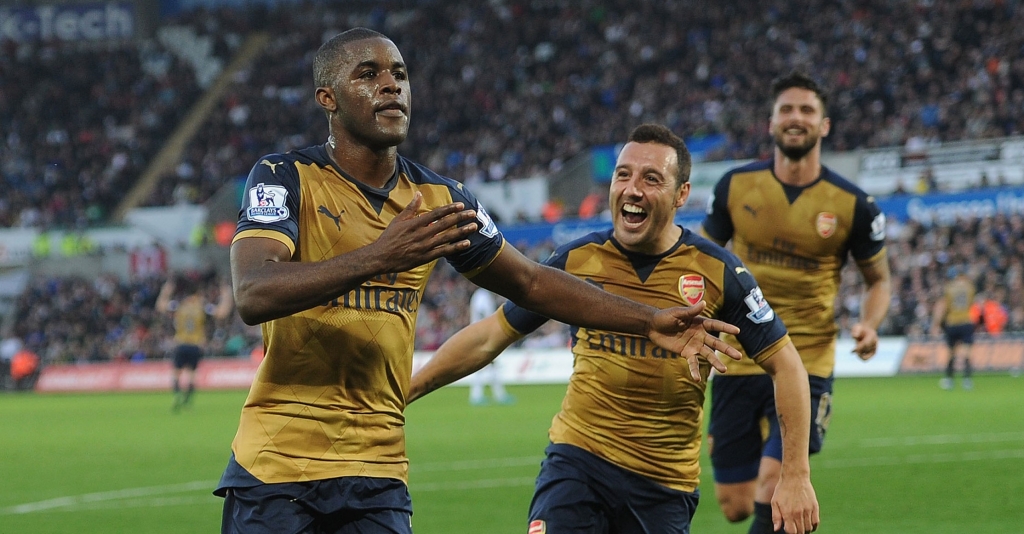 SWANSEA WALES- OCTOBER 31 Joel Campbell celebrates scoring Arsenal's 3rd goal with Santi Cazorla during the Barclays Premier League match between Swansea City and Arsenal at Liberty Stadium