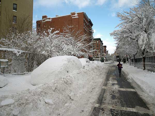 Cars remain englufed in snow on New York's Lower East Side after a blizzard in 2011.
David Shankbone  Flickr CC BY 2.0