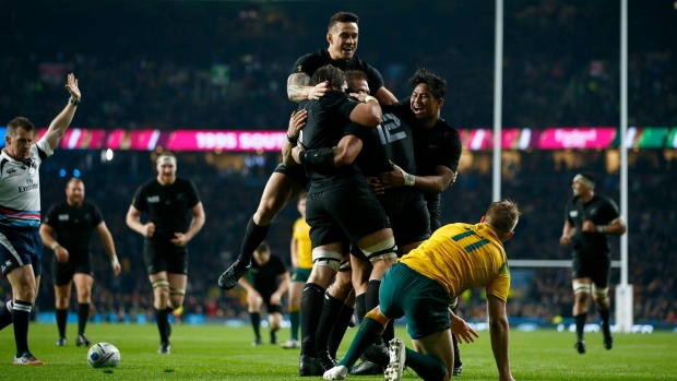 Celebration Sonny Bill Williams jumps on the huddle after Ma'a Nonu scores New Zealand's second try