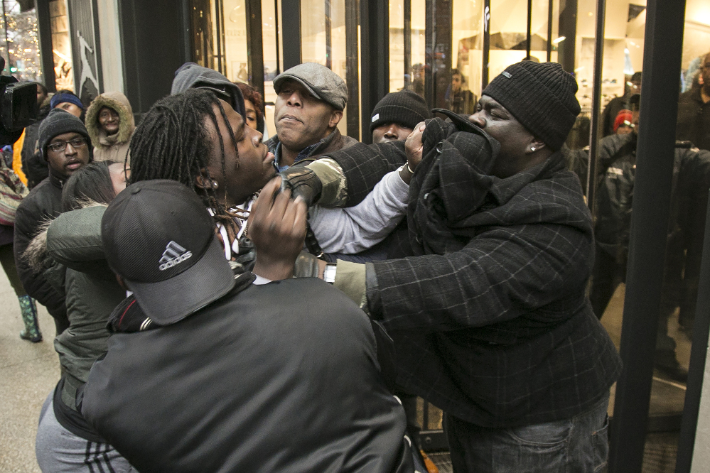 Chicago protesters block store entrances